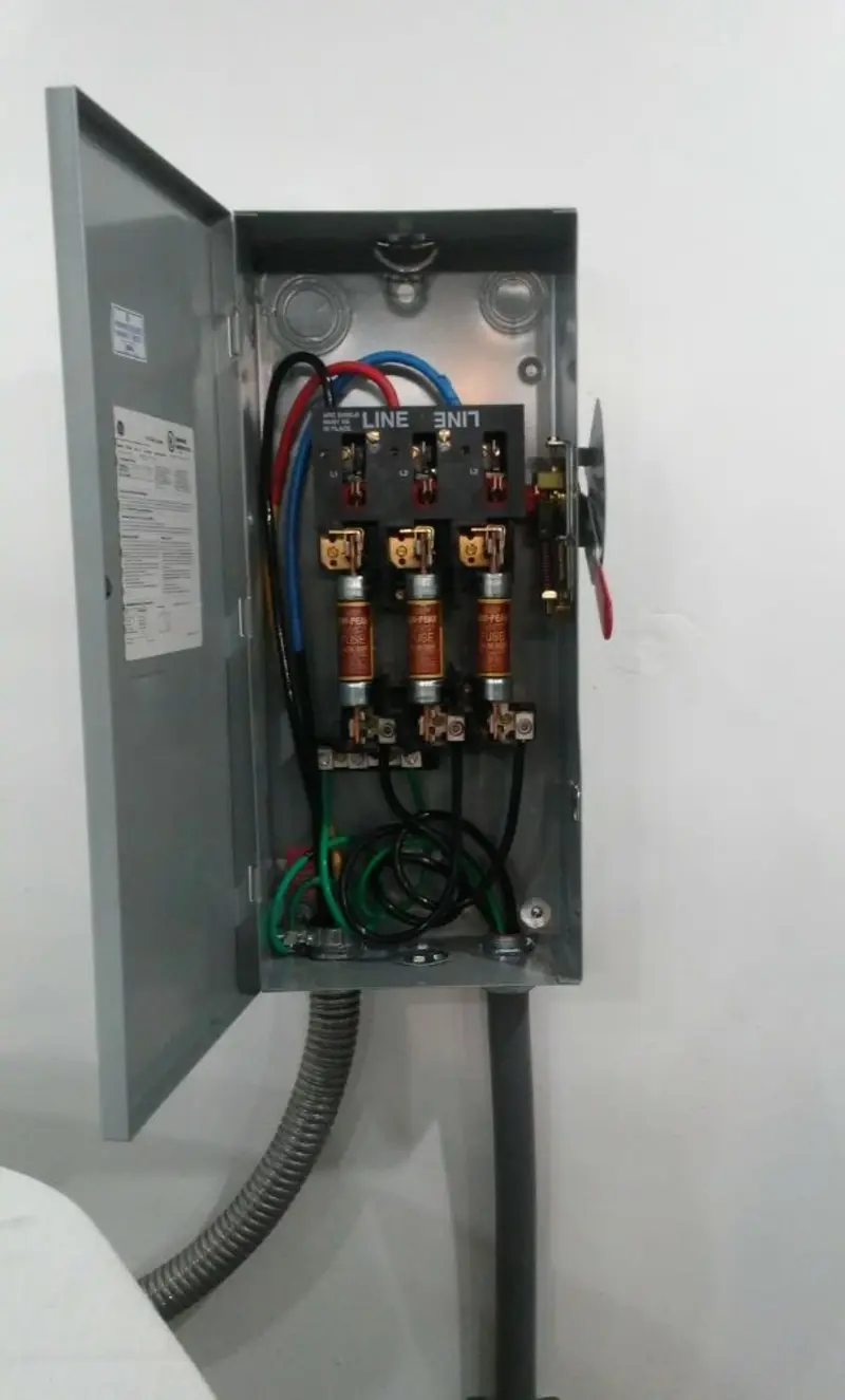 Three-phase disconnect switch installed for Smoke Detector Installation in Iron River